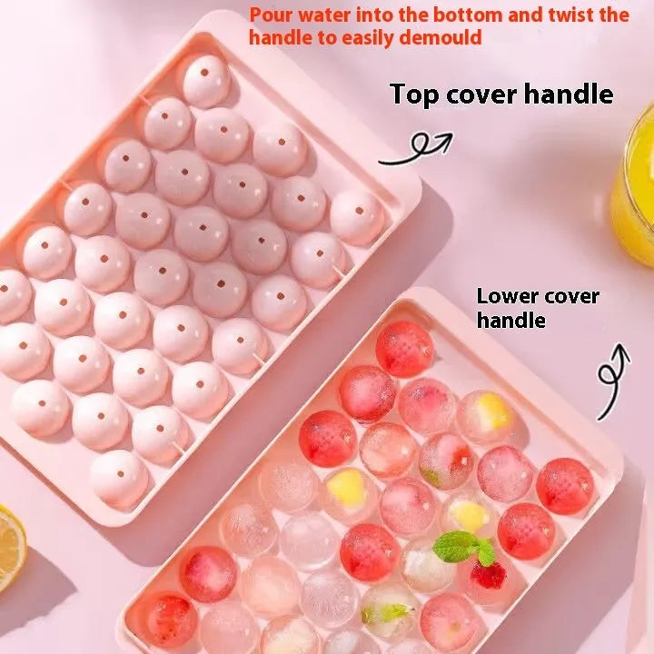 Large blue silicone ice cube tray with lid showing 33 round cavities.