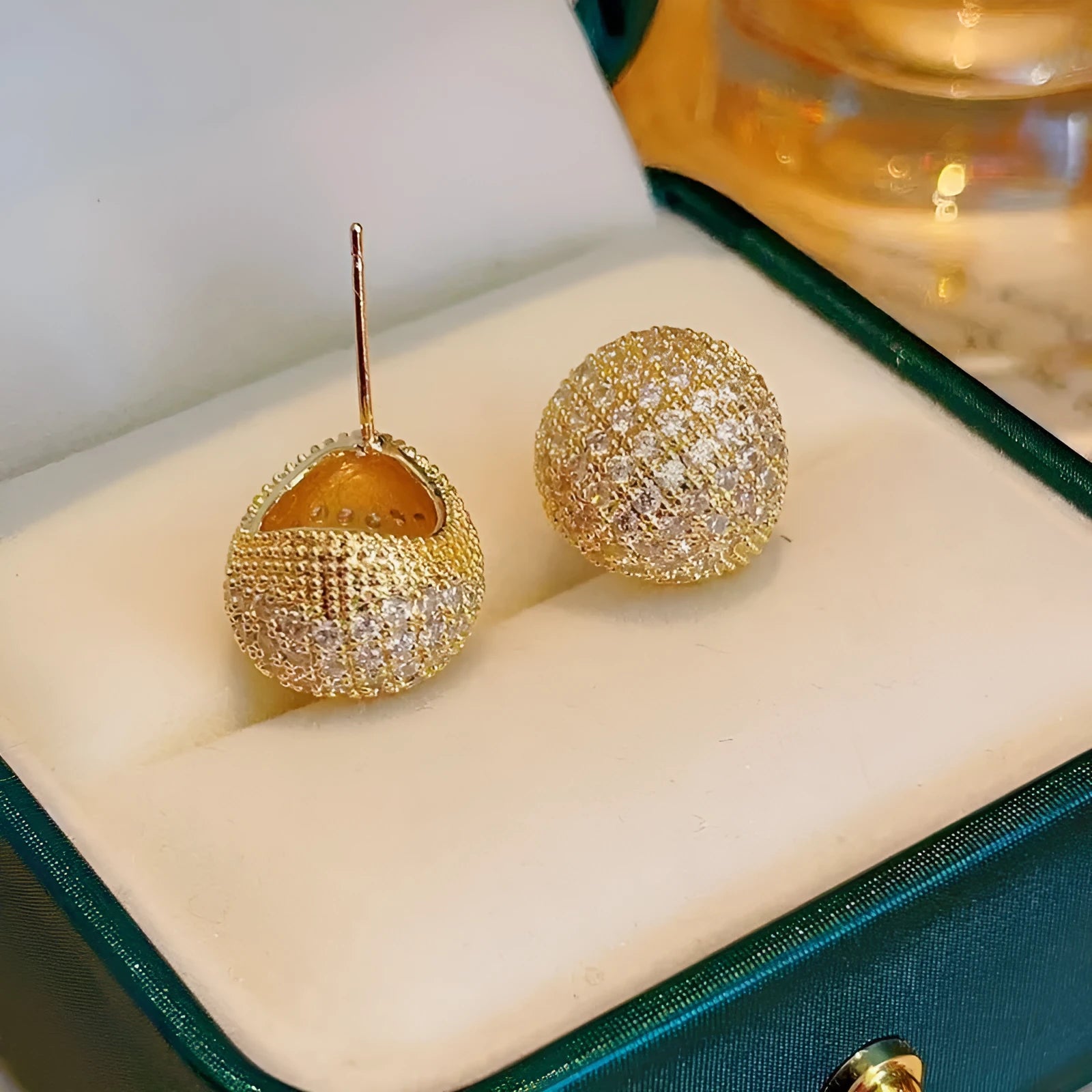 Gold and white drop earrings with geometric sphere design and full diamond little golden beans