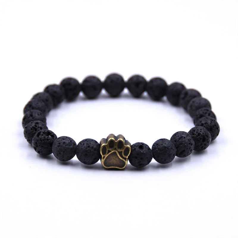 Natural stone dog paw bracelet featuring tiger eye and volcanic stone in a unisex design