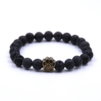 Natural stone dog paw bracelet featuring tiger eye and volcanic stone in a unisex design