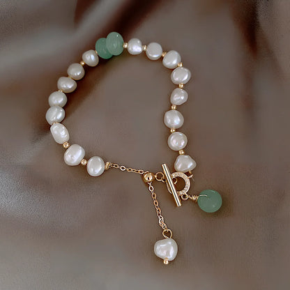 Pink irregular freshwater pearl bracelet on alloy chain, adjustable 16-22cm with 8-12mm beads