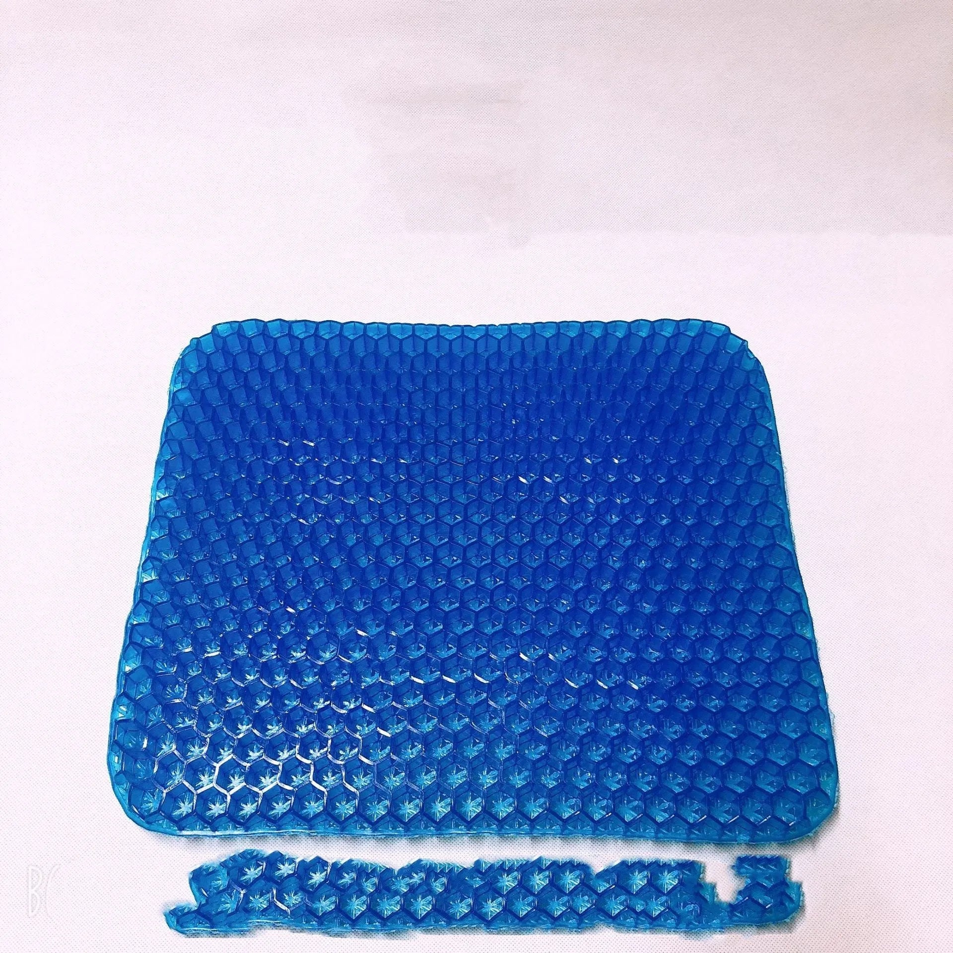 Solid colour gel seat cushion with honeycomb pattern, showing removable cover and dimensions 24.5x17.5cm