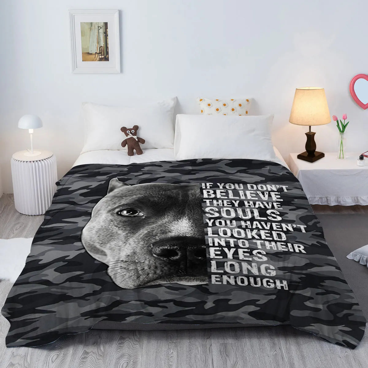 Flannel black background dog pet theme soft printed blanket folded on a sofa