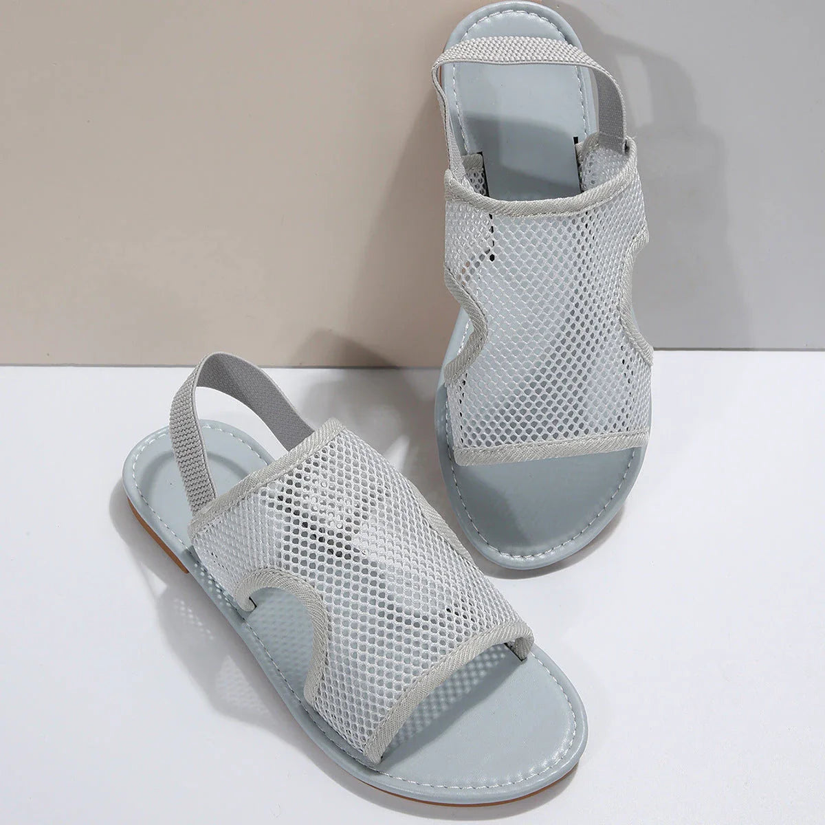 Breathable mesh sandals in various colors, perfect for summer beach and casual wear