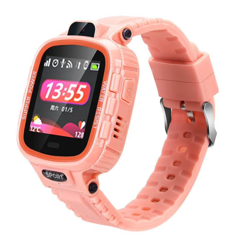 Children's GPS smart watch in pink with touch screen and camera on child's wrist