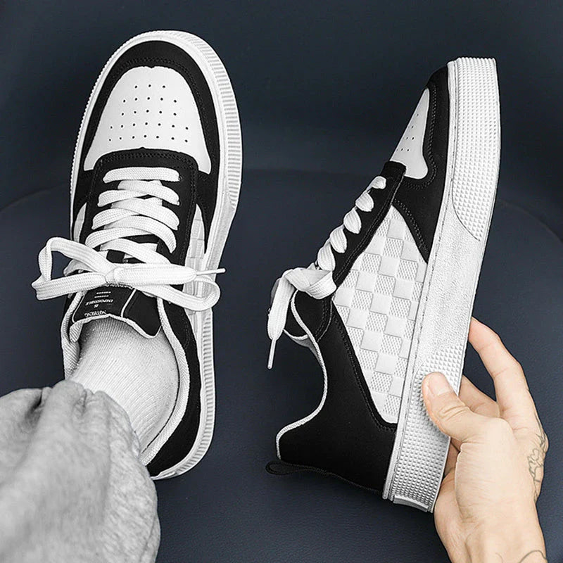 Comfortable lace-up sneakers for stylish men, featuring a unique plaid design, breathable mesh lining, and durable rubber outsole for all-day comfort and support.