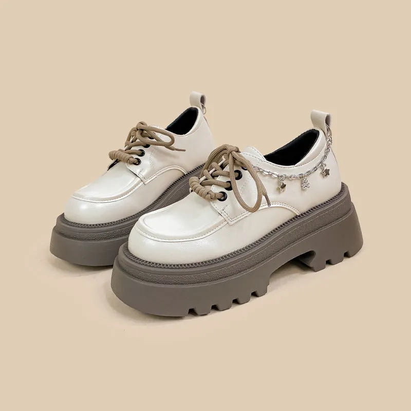 White XINGX Bear colour platform Mary Jane shoes with thick chunky heel and front lace-up.