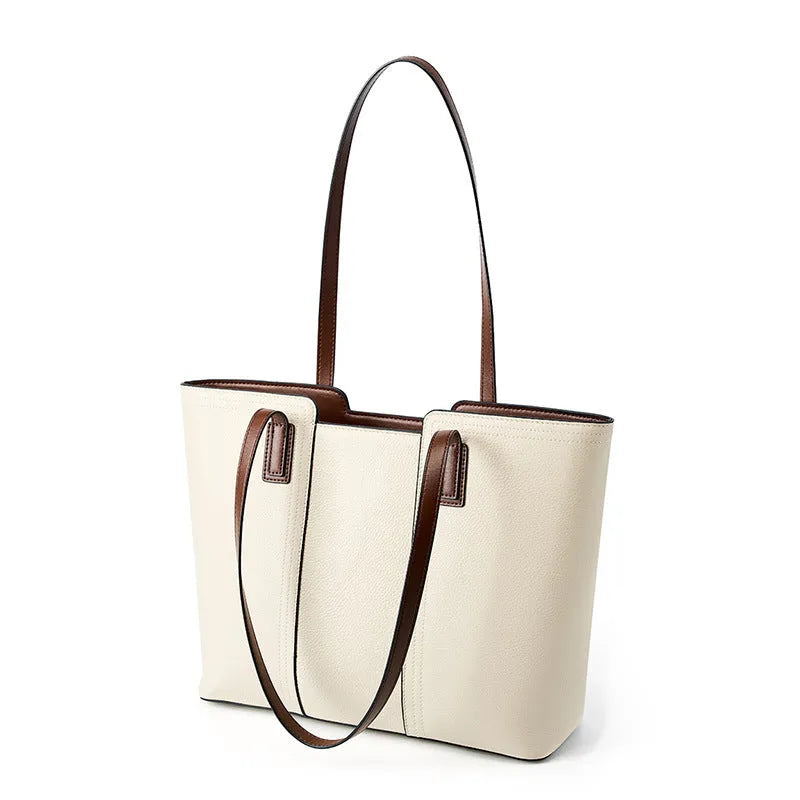 Women's genuine leather crossbody bag in horizontal square design with multiple internal compartments