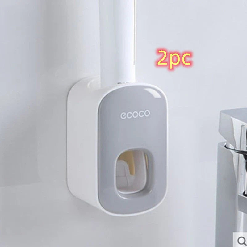 Wall-mounted automatic toothpaste dispenser with upside-down mouthwash cup for convenient and hygienic bathroom organization