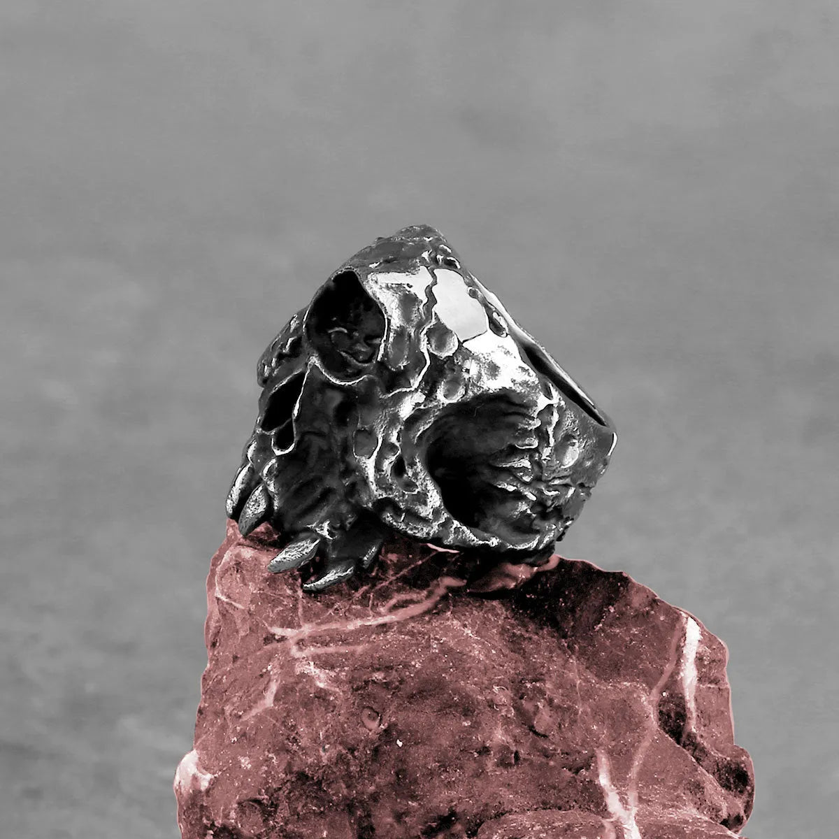 Silver alloy ring with detailed one-eyed skull design, retro punk jewellery