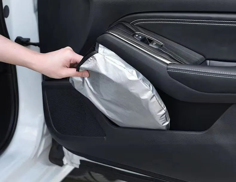 Titanium silver aluminium foil car sunshade laid flat showing its rectangular shape and size.