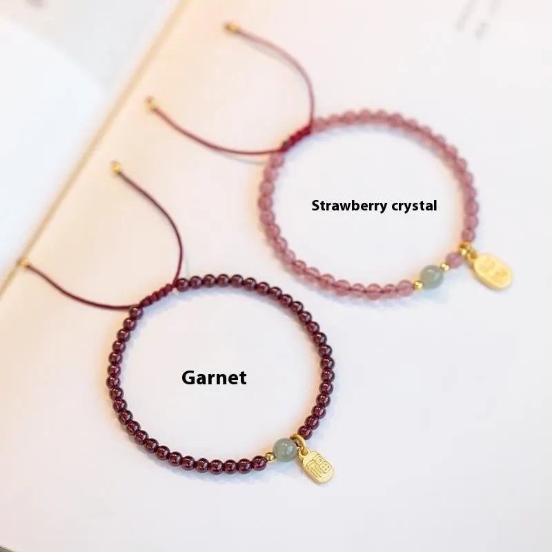 Hand-woven red rope bracelet with strawberry quartz and garnet beads for women