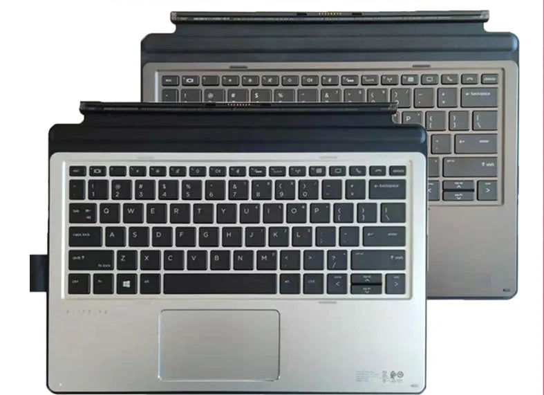 Elite and Pro series wireless keyboard with multimedia keys and PS/2 port on a desk.