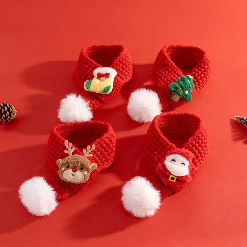 Christmas cat scarf with striped cartoon pattern in festive colours on a light background