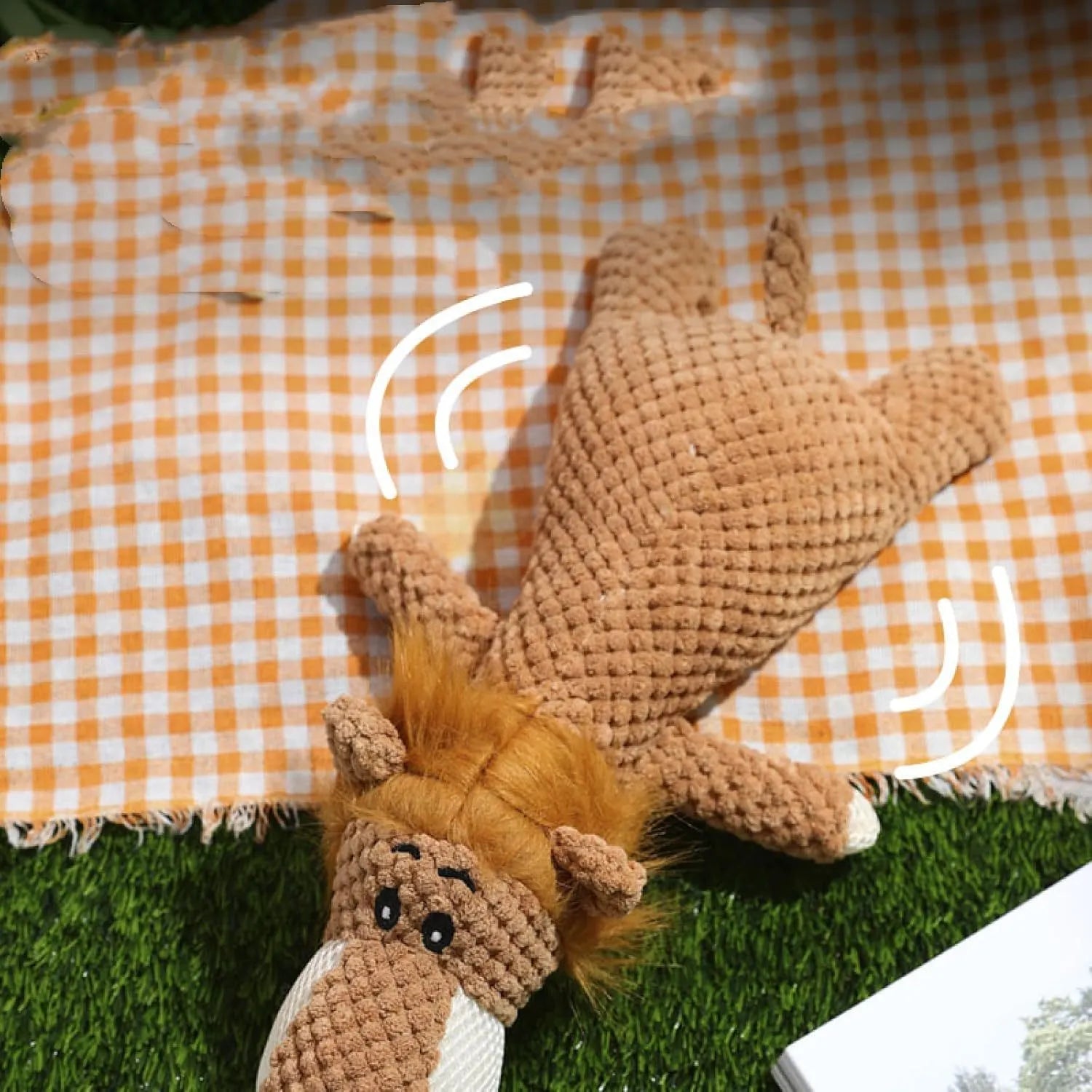 Green, grey, and yellow corn-shaped plush dog toys with a grunting sound device.