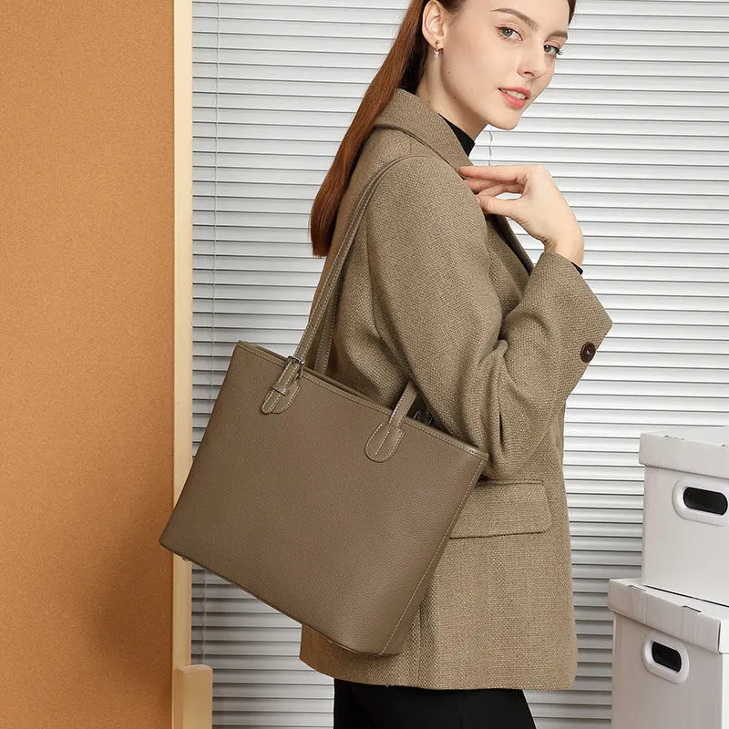 Genuine leather women's tote bag in retro square style with internal organiser pockets.