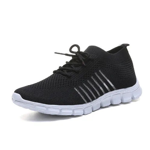 Women's high-cut lace-up sneaker in a choice of colours, showing breathable upper and flat rubber sole.