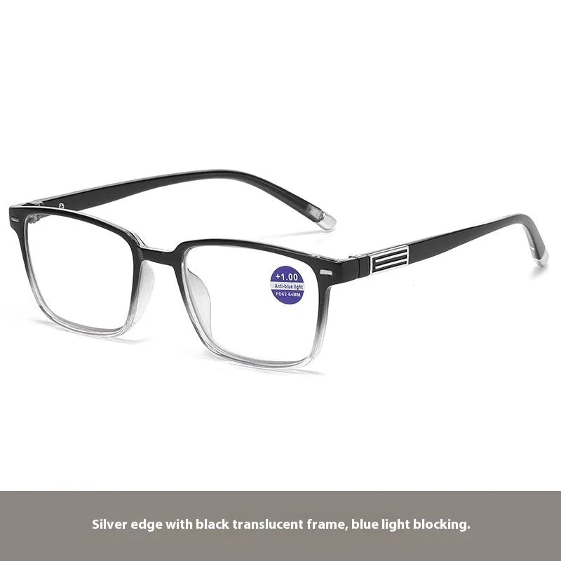 A pair of multifocal reading glasses with colour changing, anti blue light PC lenses in a black and silver frame style.