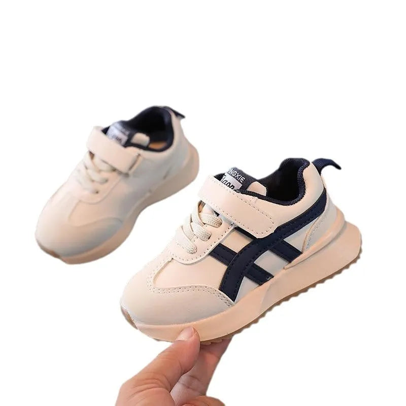 Children's white synthetic leather sneakers with Velcro closure and non-slip rubber soles