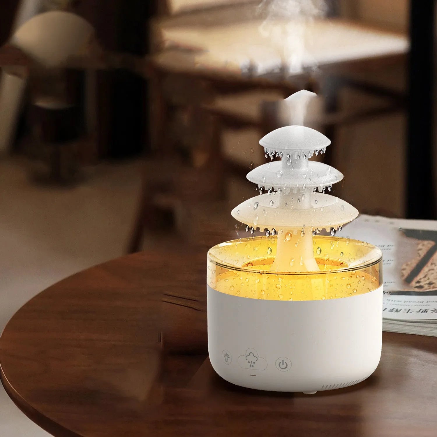 White cloud-shaped humidifier with colourful LED lights and mist output