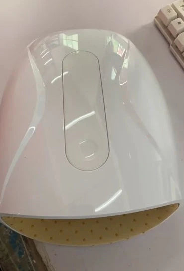 Electric mouse hand massage instrument with heating function, white colour, compact size 24x13cm