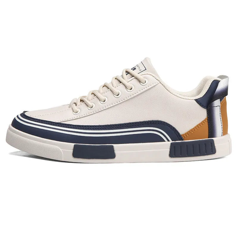 Men's beige and white with green casual canvas shoes showing mesh panel sections on sides.