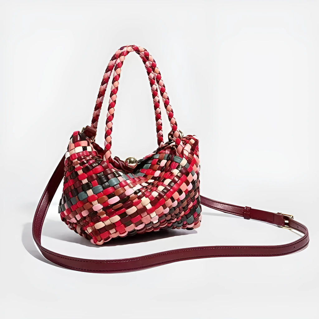 Women's woven PU leather shoulder bag showing handmade detailing and 18x11x14cm dimensions