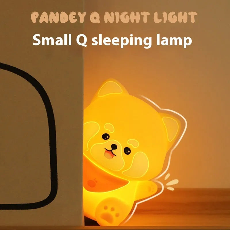 New Homehold Lesser Panda bedside lamp with silicone shade and USB charging cable on a table