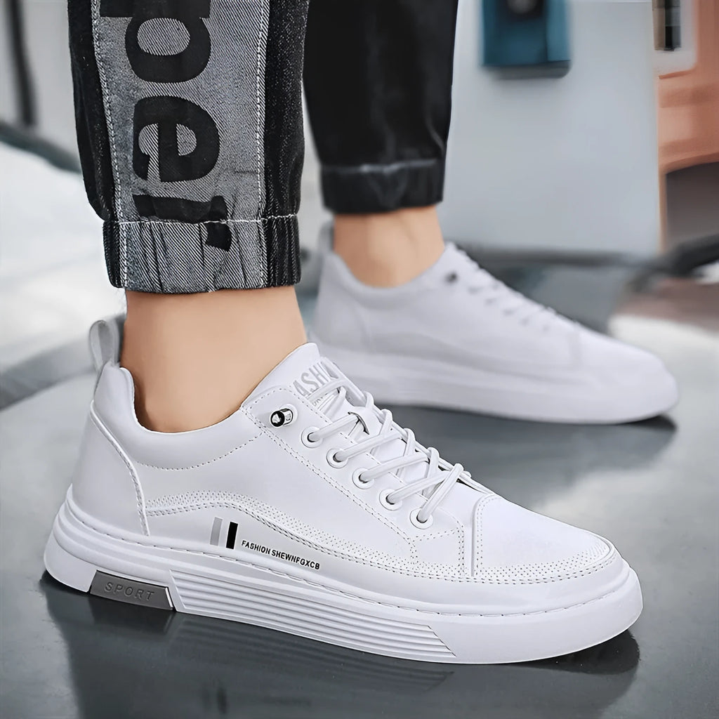 Men's low-top black and white skateboard shoes with elastic band closure and rubber sole