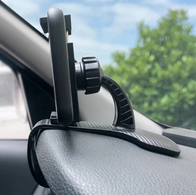 Dashboard-mounted car phone holder with adjustable ball head and stretchable silicone clip for conventional smartphones