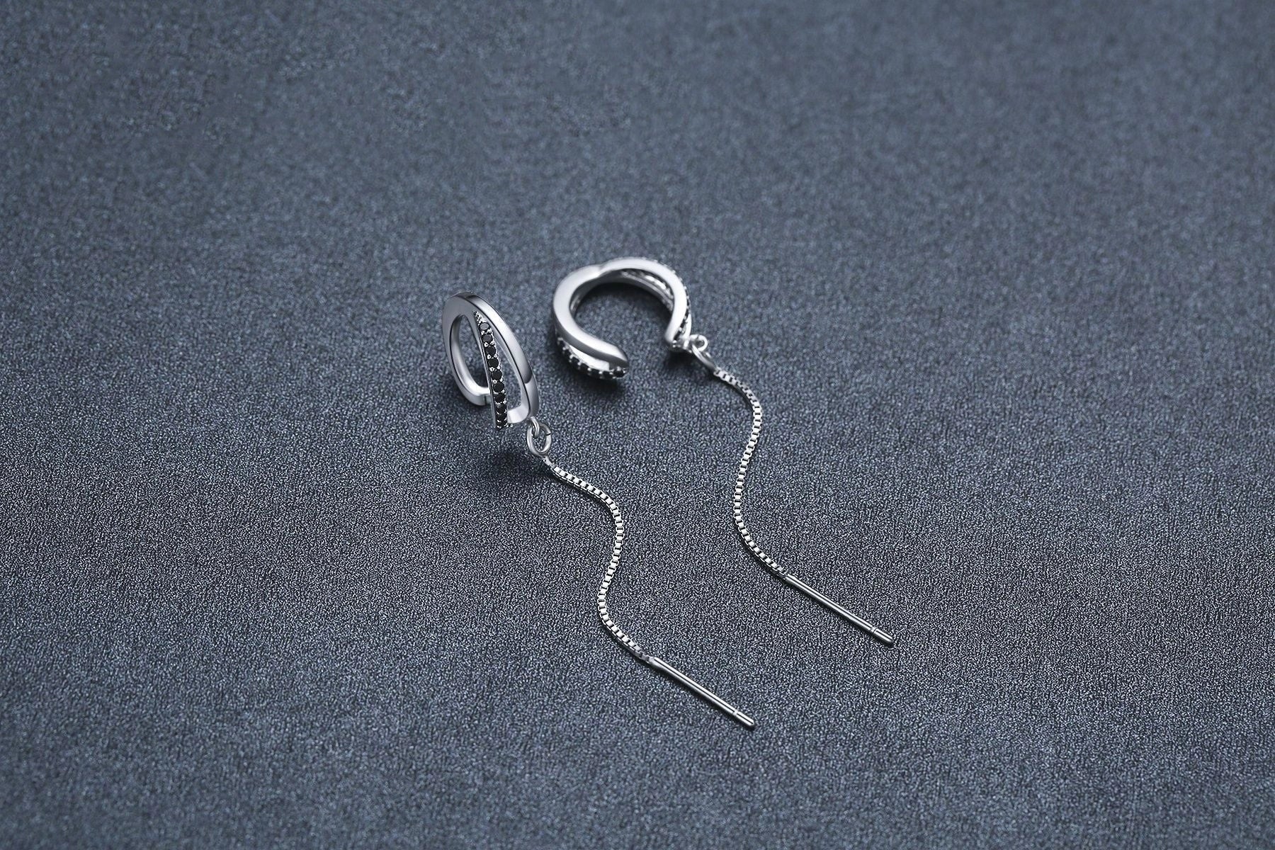 Black geometric tassel ear clips made from durable copper, lightweight design