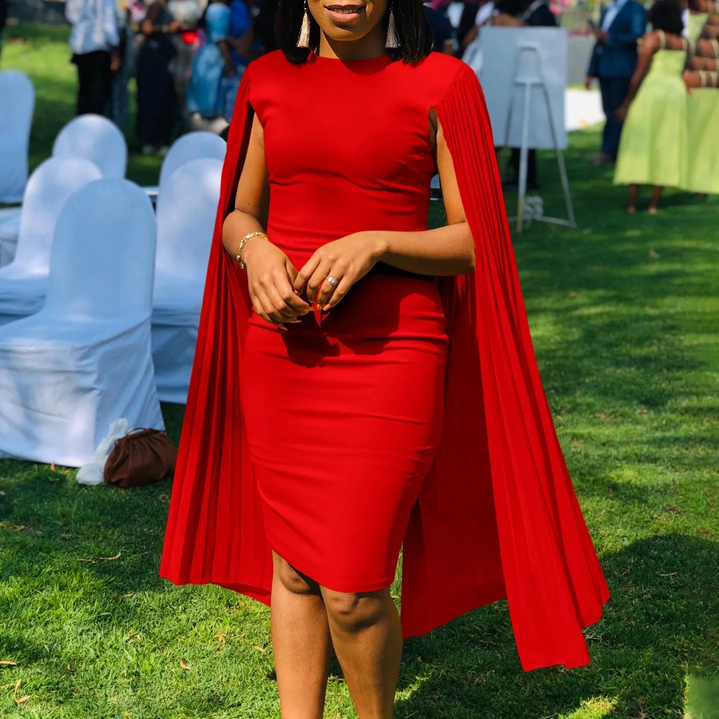 Long sleeve high waist evening gown with a pleated shawl in yellow, orange, red, or green
