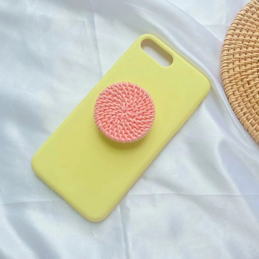 Bamboo woven telescopic phone stand extended to 25cm height holding smartphone