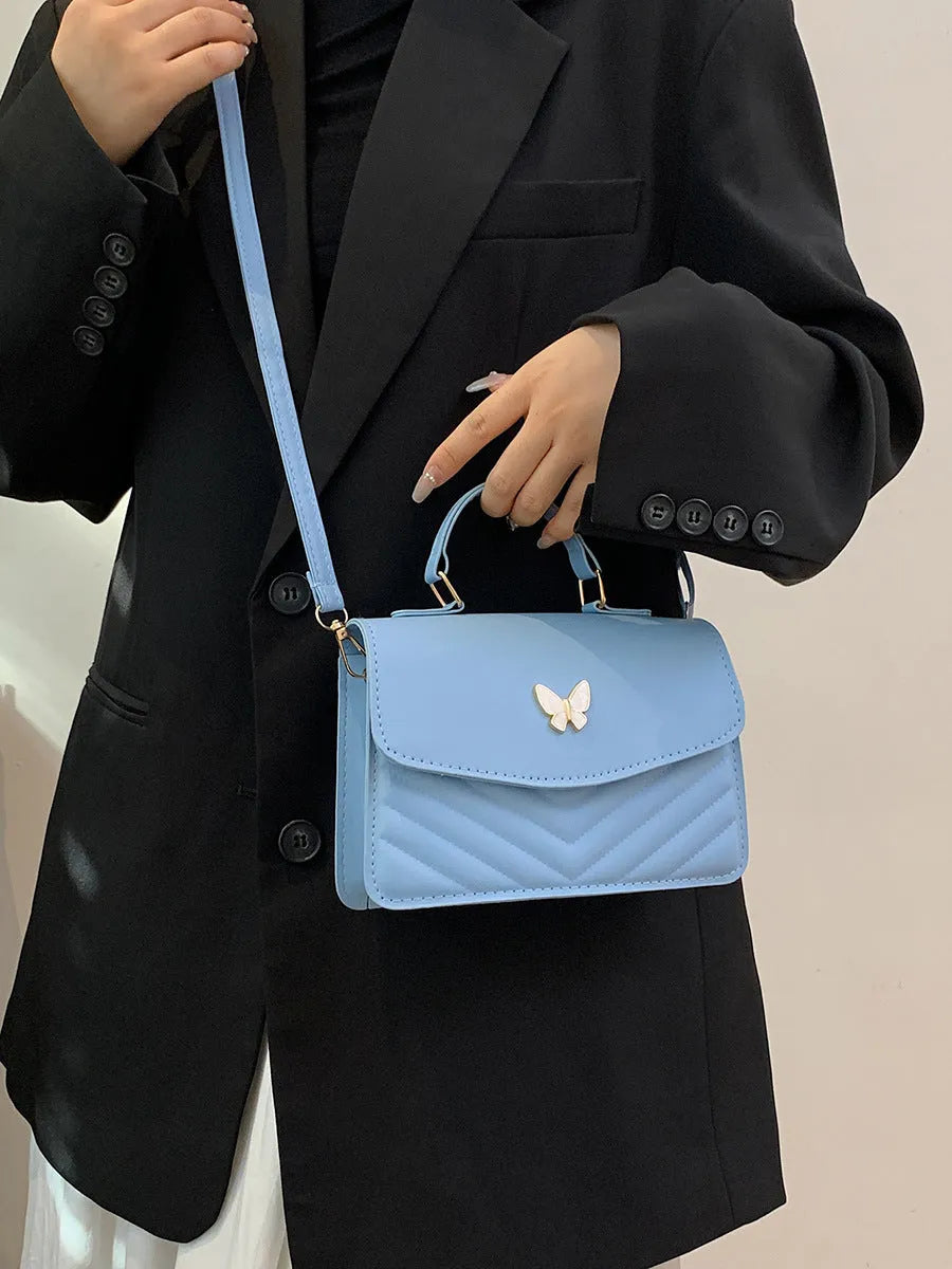 Women's PU horizontal square handbag with bow detail in dark blue colour option