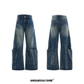 Men's verdant blue loose fit jeans with a washed burst pattern and curved knife leg style.