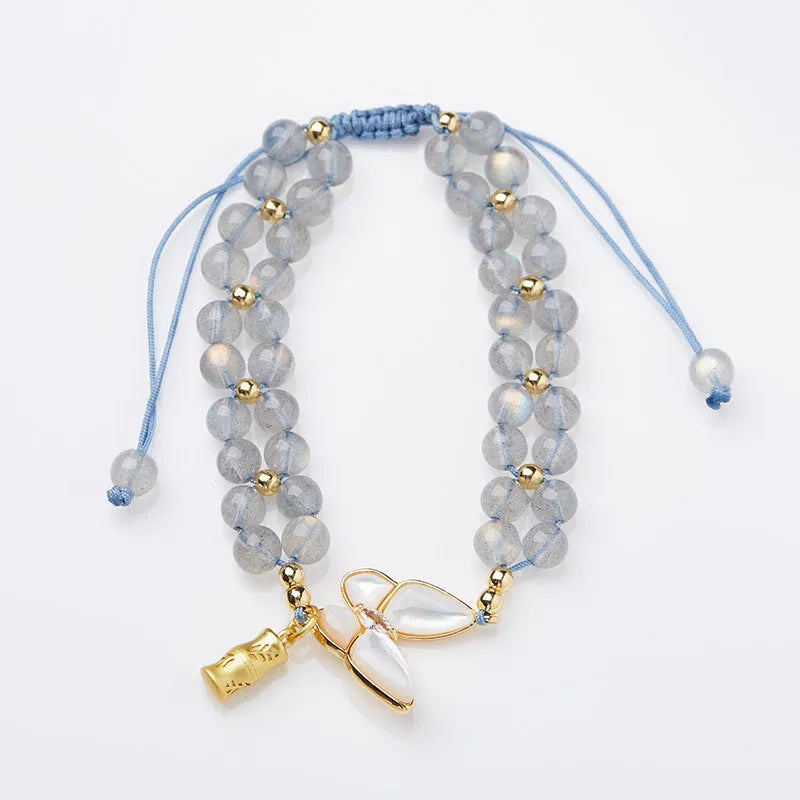 Grey moonstone geometric bracelet with butterfly woven hand rope for women.