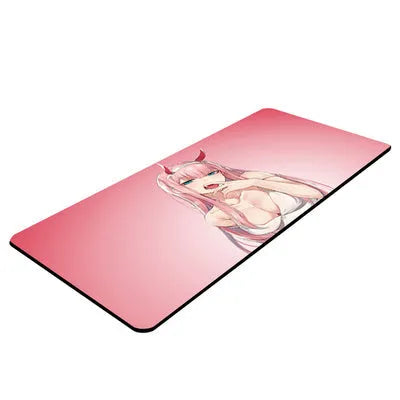 Pink Darling anime cloth keyboard mat on a desk with a mouse and keyboard