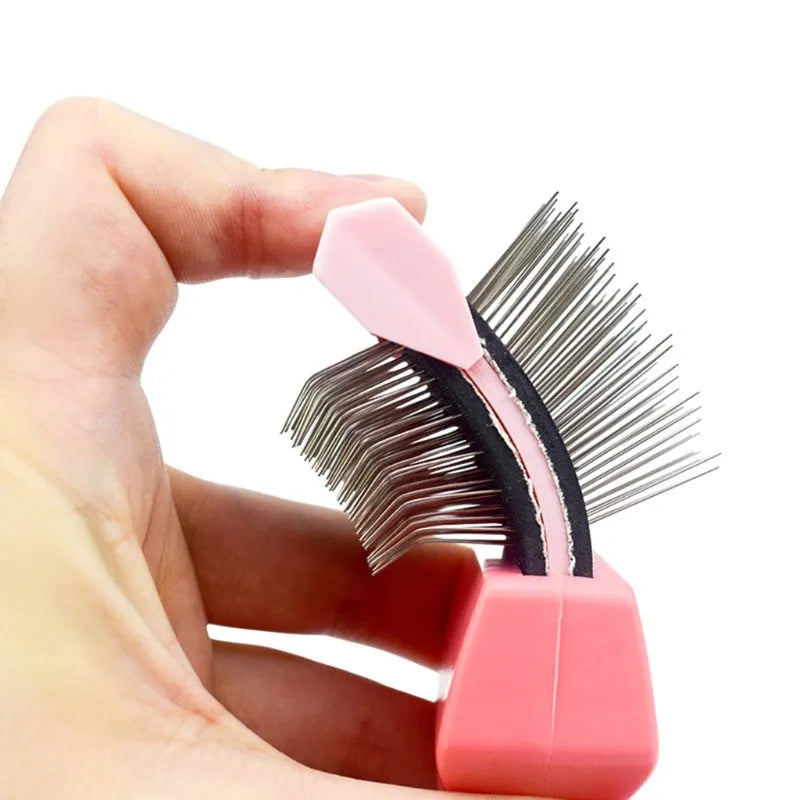 Double-sided pet grooming brush with stainless steel pins and ergonomic handle in blue