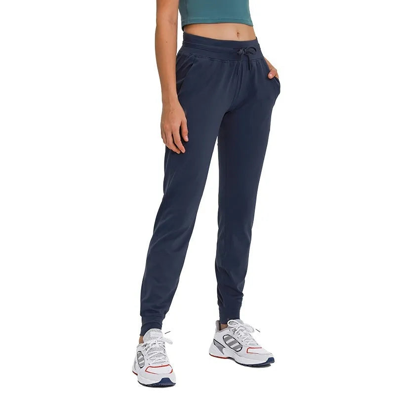 Women's high waist yoga pants with drawstring in various colours including distilled coffee and Belgian blue