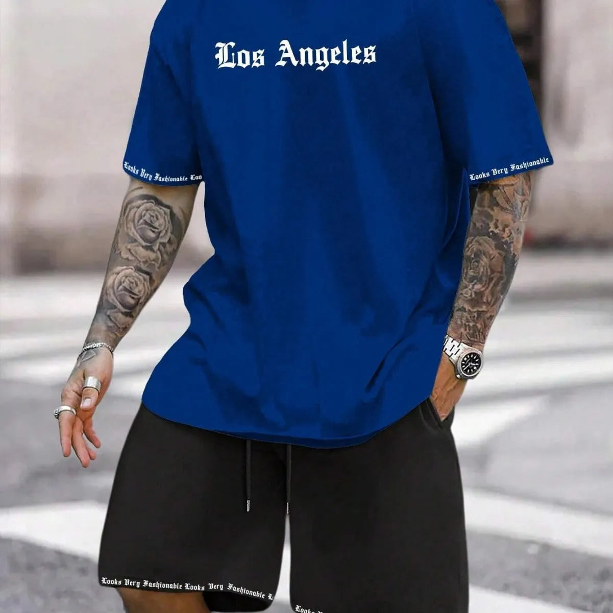 Men's sports style short-sleeved suit set with matching shorts in polyester blend fabric
