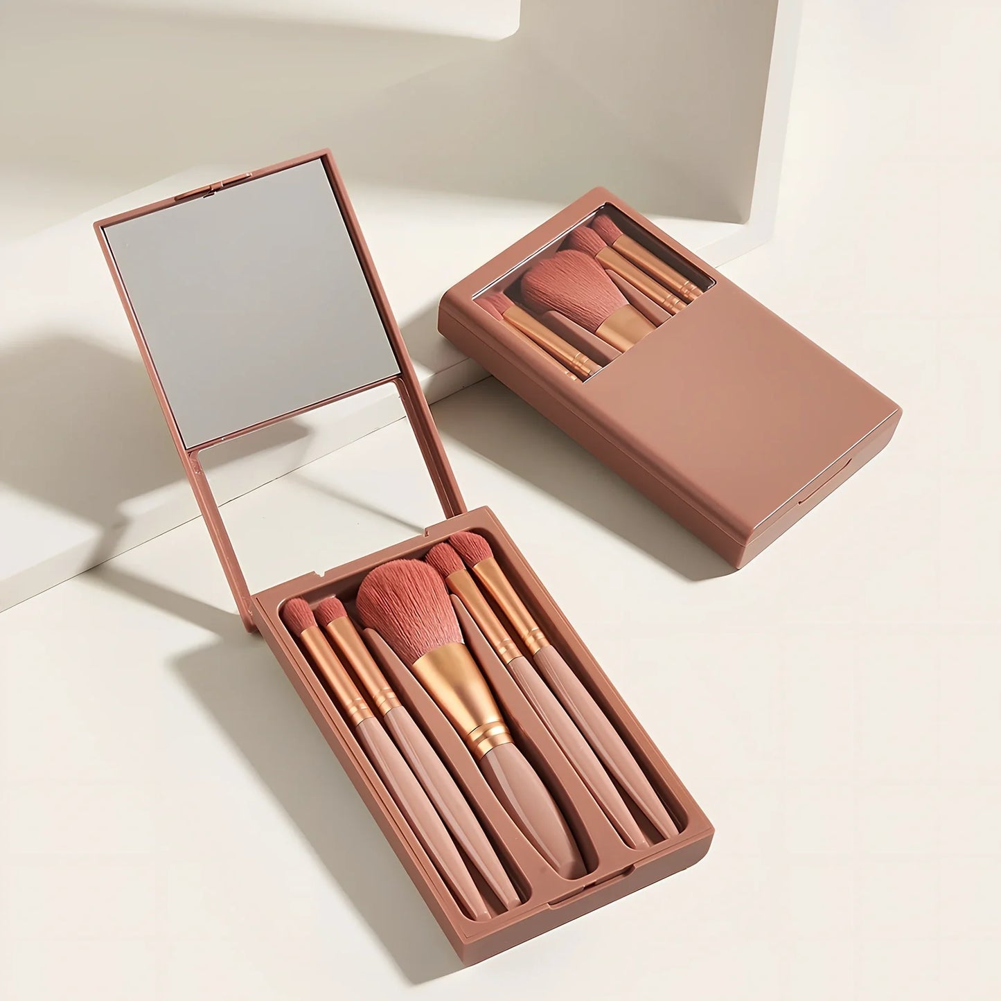 Sky blue 5-piece makeup brush set with plastic handles and travel mirror box, compact for bags