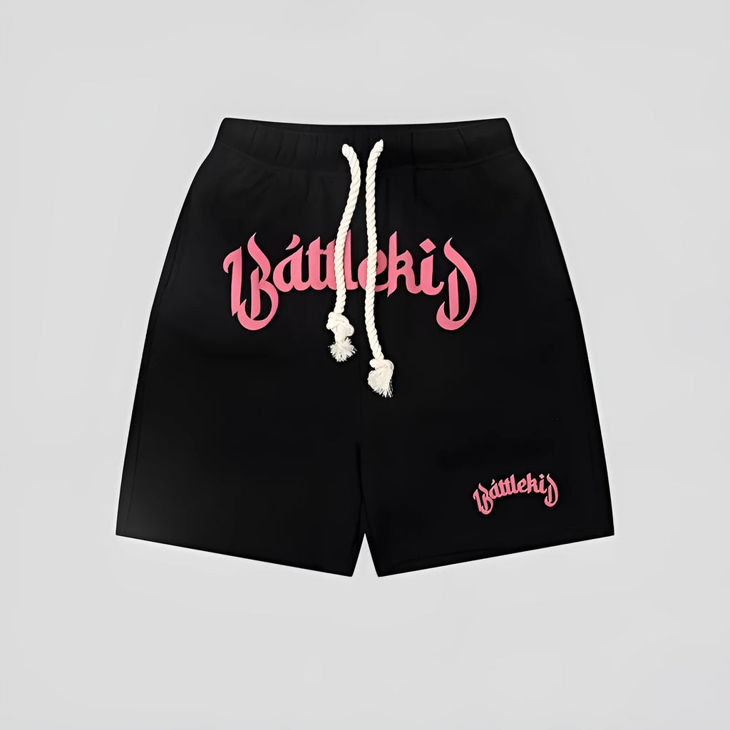 Cotton-blend loose-fit street shorts in black, shown in a casual setting.