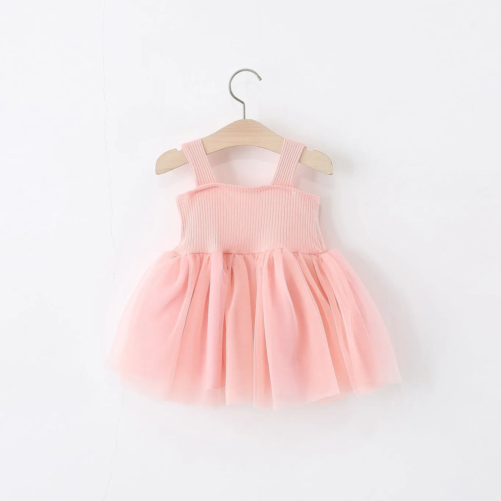 Girls sleeveless solid colour summer dress in polyester fibre, sling style, available in pink and red sizes 80-120