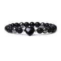 Hand-cut geometric peach heart stone bracelet with moon and planet decorative elements in eight colour options