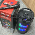 Black portable Bluetooth speaker with dual horn cannon design showing USB charging port and compact dimensions