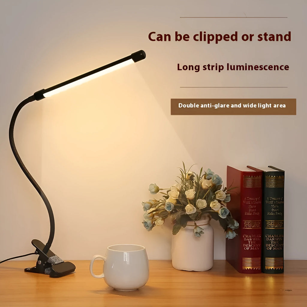 Black or white USB-powered LED desk lamp on a desk, showing its 26 cm compact length.