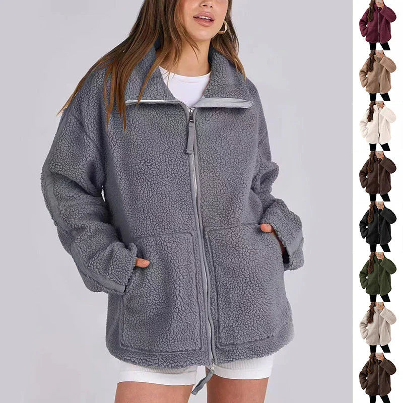 Stylish women's fleece zip-up jacket with pockets in various colours