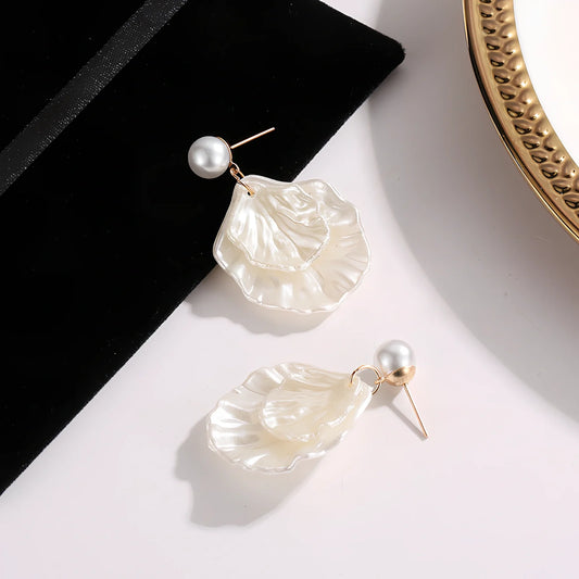 Women's acrylic pearl shell earrings with 5.2g lightweight design and shell shape