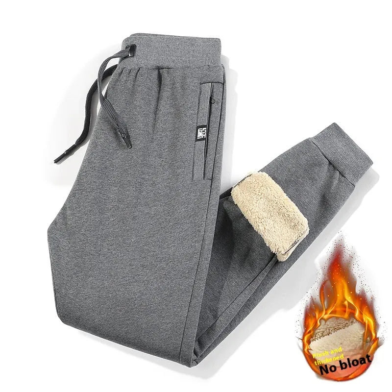 Men's grey fleece-lined cotton track pants with elastic waist and straight leg cut