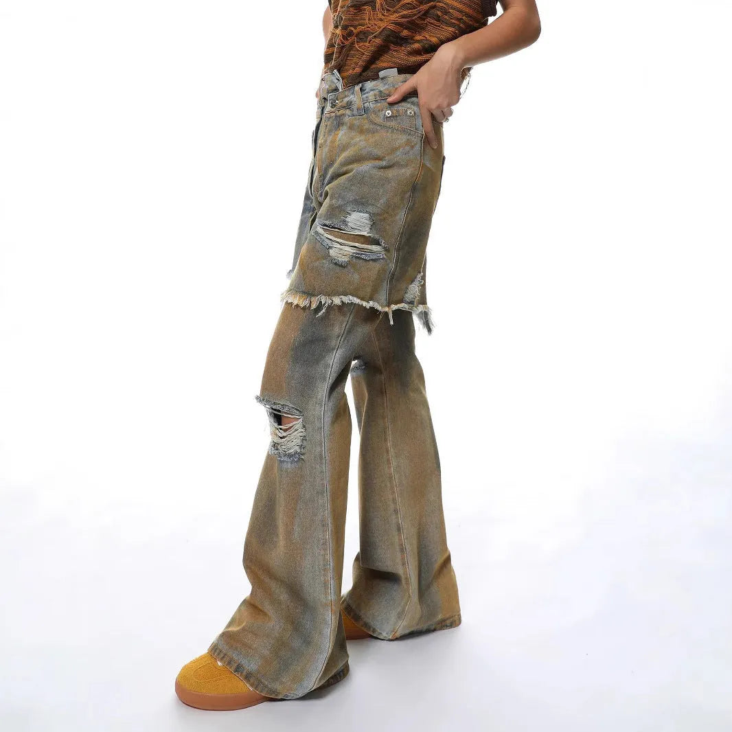 Women's loose hole bootcut jeans in picture colour with a high waist and button fly.